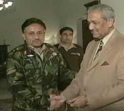 Musharraf and A. Q. Khan. (The date and location of the photo is unknown.)